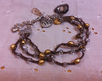 BRIGHTON &quot;Karma Brown Corded Crystal Heart&quot; Teardrop Bracelet. Maker&#39;s charm attached.