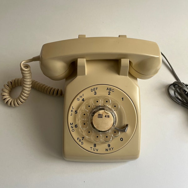 Vintage Northern telecom rotary phone - light beige color and in good working condition