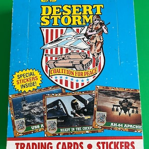 Sealed box of Desert Storm cards by Topps 1991 - 36 packs and each pack contains one sticker.