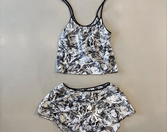 Conjunto de lencería de malla en blanco y negro con estampado de Marilyn Monroe