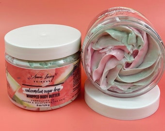 May include: Two clear jars of whipped body butter with white lids. One jar is closed, the other open, revealing pink and green swirls. The label reads "watermelon sugar drop" and "whipped body butter". Each jar contains 6 oz / 170 g of product.