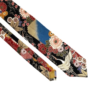 May include: A necktie featuring a black background with a vibrant pattern of red, white, and pink chrysanthemums, gold maple leaves, and a white crane in flight. The design includes blue accents and intricate gold detailing throughout the fabric.