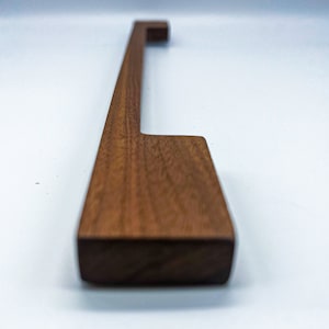 Walnut wood handmade handle, chocolate brown with visible grains. With wide , comfortable grip, minimalist design.