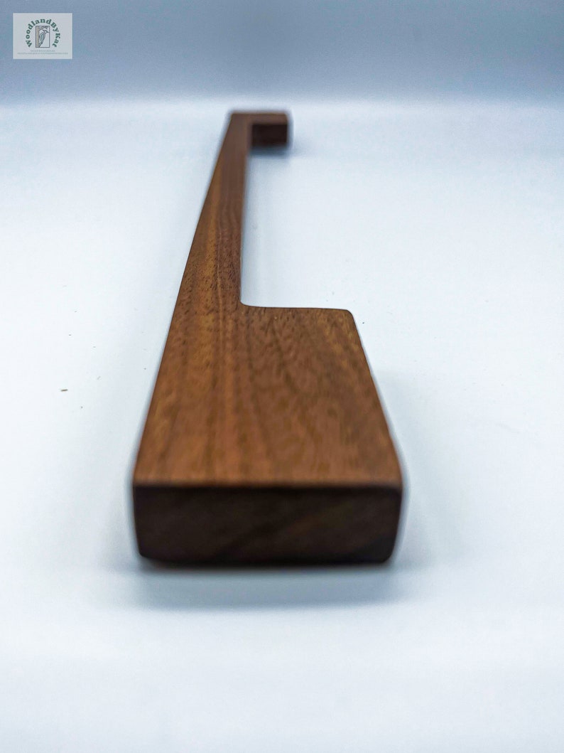 Walnut wood handmade handle, chocolate brown with visible grains. With wide , comfortable grip, minimalist design.