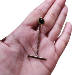 Gold Toned Black Stone Oval Tie Tack 2&quot;