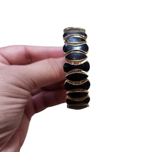 Bracciale vintage con gemma nera color oro