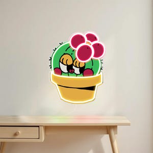 Lámpara LED de neón con forma de cactus: brillo vibrante y divertido de dibujos animados sonrientes con flores, perfecta para amantes de las plantas y espacios alegres y divertidos