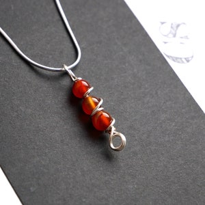 Handmade Carnelian Pendant: Silver Wire Wrapped Birthstone Jewelry