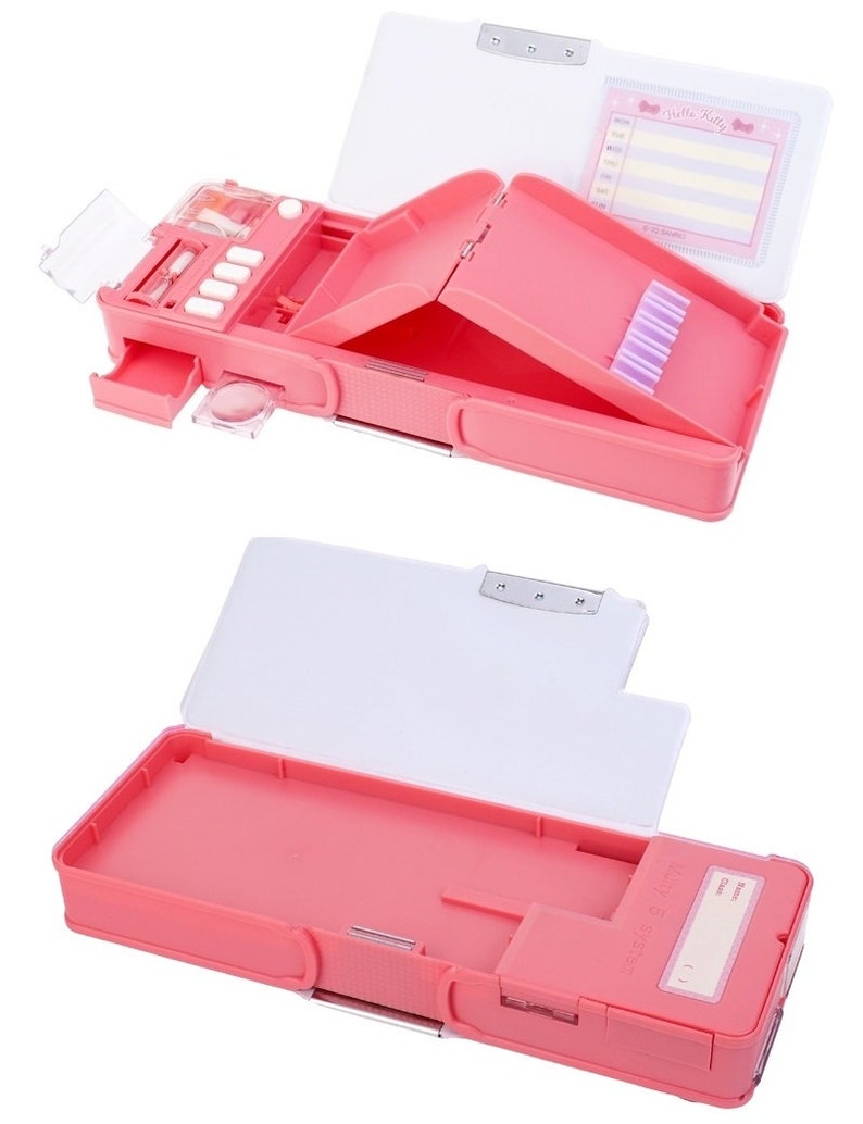 May include: Pink plastic pencil case with a built-in sharpener and a secret compartment. The case has a Hello Kitty design and a name tag.