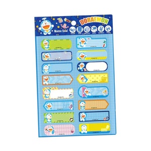 May include: A sheet of colorful Doraemon name labels with a blue background. The labels feature different images of Doraemon, a popular Japanese cartoon character, and have blank spaces for writing names. The sheet includes the text "Name Seal" and "Doraemon".