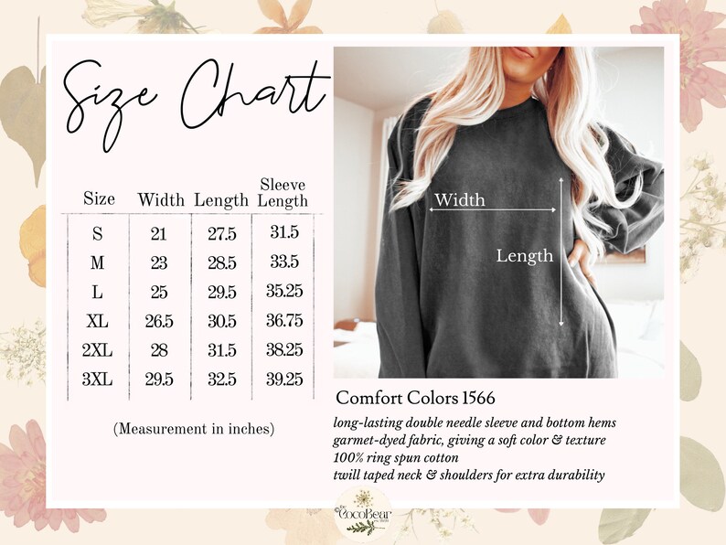 Op de afbeelding: Maattabel voor een sweatshirt met afmetingen in inches voor breedte, lengte en mouwlengte. De tabel toont maten S tot en met 3XL. Het sweatshirt wordt beschreven als een duurzame dubbele naaldmouw en zoom, garment-gekleurd materiaal, wat een zachte kleur en textuur geeft, 100% ringgesponnen katoen, twill getapete hals en schouders voor extra duurzaamheid. Het merk is CocoBeur.