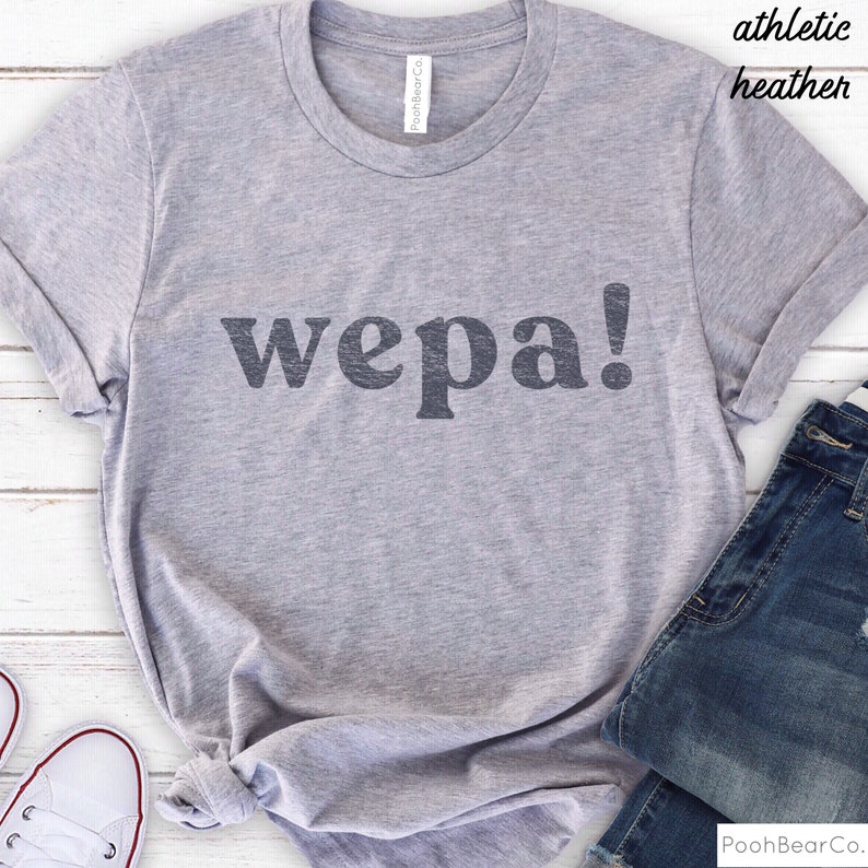 May include: A gray athletic heather t-shirt with the word "wepa!" printed in black.