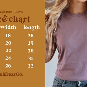 K&ouml;nnte beinhalten: Gr&ouml;&szlig;entabelle f&uuml;r ein Unisex-T-Shirt von Bella + Canvas. Die Tabelle zeigt die Breite und L&auml;nge in Zoll f&uuml;r die Gr&ouml;&szlig;en S, M, L, XL und 2X.