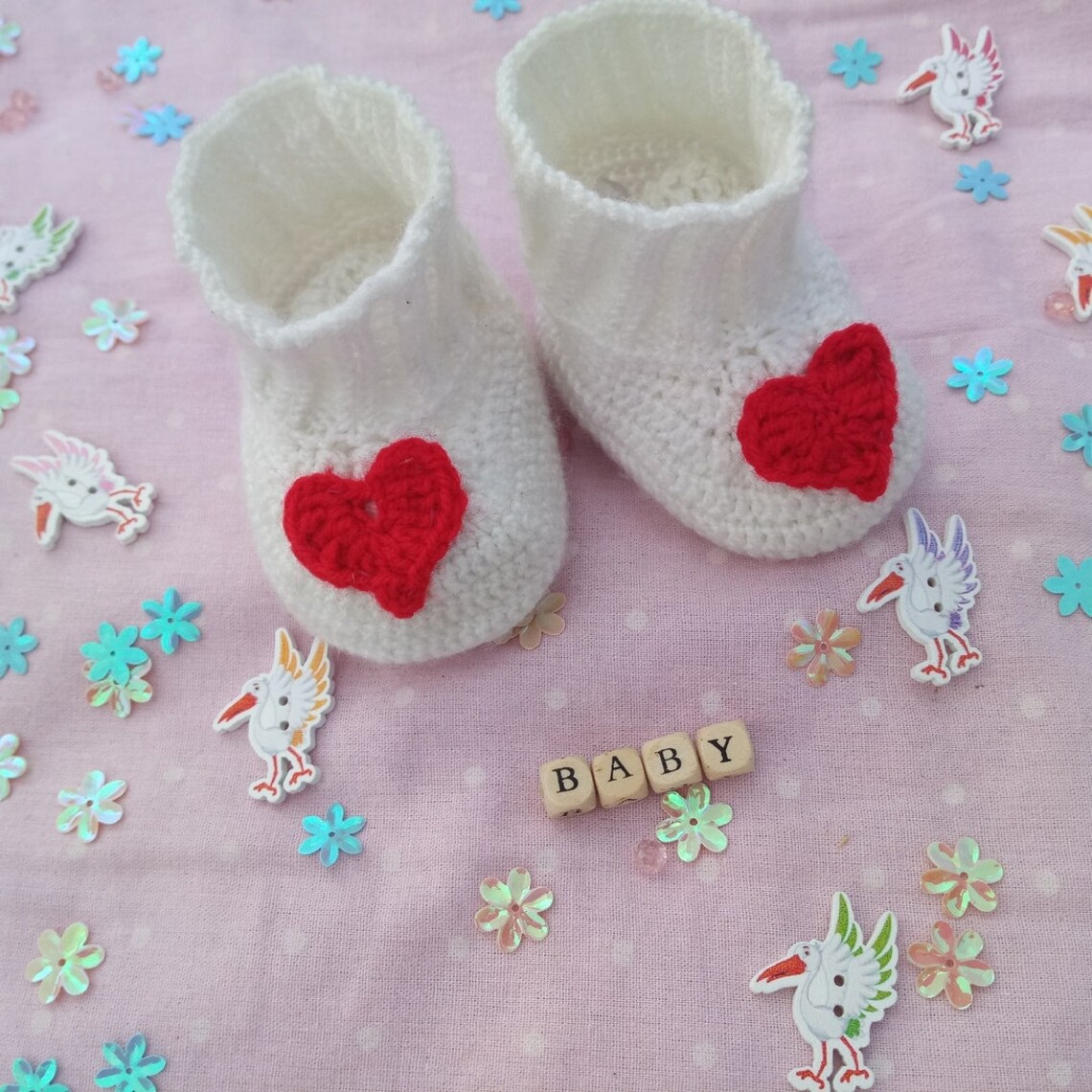 Neutral white baby booties with heart shaped elements Etsy