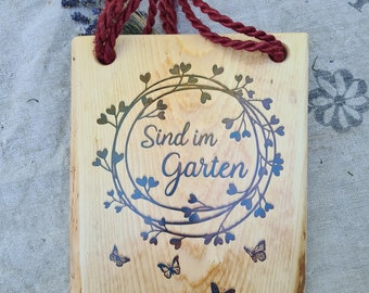 Hanging sign / mural "We are in the garden" made of wood - for the entrance area or the home - handmade with wood from home