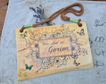 Hanging sign / mural "We are in the garden" made of wood - for the entrance area or the home - handmade with wood from home