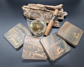 May include: Four wooden coasters with different whiskey-themed designs. The coasters are dark brown with gold lettering and images. The text on the coasters reads "Whiskey is always a good idea", "Original Whiskey", and "Whiskey is always a good idea".