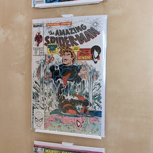 Boarded Comic Book Wall Mount display shelf, bagged, comic stand, display stand