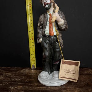 Statuetta vintage di Emmett Kelly Jr. nei panni di un clown / Borsa a tracolla Flambro con borsa Bindle (1984)