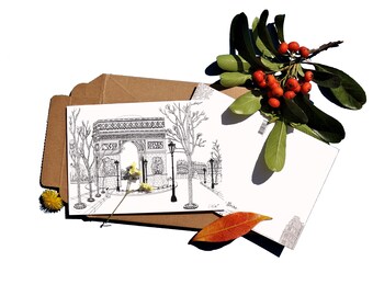 May include: A black and white line drawing of the Arc de Triomphe in Paris, France. The drawing is on a white card with a brown envelope behind it. There are some dried flowers and leaves on the card and envelope.