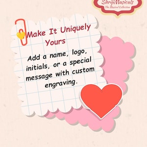 May include: A square note with scalloped edges featuring a grid pattern, a red paperclip with a yellow heart, and a red heart icon. The text reads: Make It Uniquely Yours. Add a name, logo, initials, or a special message with custom engraving.