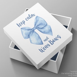 May include: A white box with a blue watercolor bow and the text "Keep calm and Wear Bows".