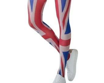 May include: Leggings featuring a red, white, and blue Union Jack flag pattern. The leggings are worn with plain white lace-up sneakers. The design covers the entire length of the legs, displaying the iconic geometric cross and diagonal stripes.