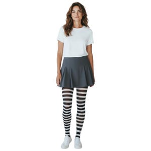 May include: A white short-sleeved t-shirt, a solid dark gray pleated mini skirt, and black and white horizontally striped tights paired with white sneakers. The outfit consists of a simple top, a flared skirt, patterned hosiery, and footwear.