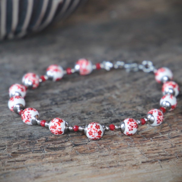 Bracelet fleurs porcelaine rouge et blanc/acier inoxydable/céramique
