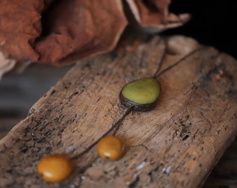 Green and mustard vegetal ivory/tagua/sliding necklace