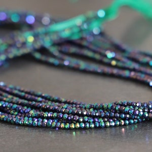Perle di vetro sfaccettate iridescenti multicolori /2x1.5mm/foro 0.8mm/circa 235 pezzi per filo /37 cm il rosario