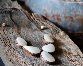 Natural color vegetable ivory necklace on drawstring/tagua/palm seed