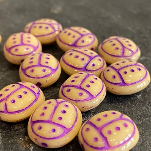 Perle di coccinella in vetro ceco beige e viola-2 pezzi