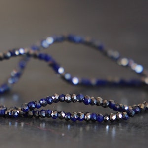 Perle di vetro sfaccettato mezzo placcato blu di Prussia e bronzo/2x1.5mm/foro 0.4mm/filo 28cm-circa 195 perline