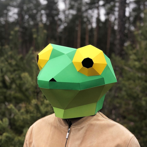 Masque grenouille DIY : créez le vôtre à l'aide d'un modèle low poly et d'instructions simples. Transformez-vous en grenouille ou en lézard mignons ! Téléchargement PDF lors de l'achat