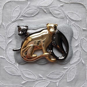 Broche - Liz Clairborne Gold and Black Panthers-broche