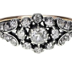 Anillo victoriano antiguo y racimo de diamantes