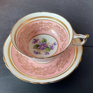 RARE Vintage Paragon England fine bone China Pink Scroll Gold gilt Violets Tea cup and saucer, gold trim.  A1585