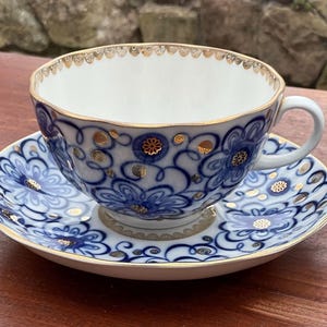 Lomonosov Porcelain "Bindweed" teacup and saucer set "Tulip" shape. 22-karat gold accents