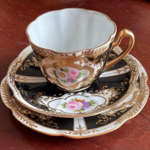Noritake gold encrusted, hand painted Cup, saucer, plate set. Rare Vintage set