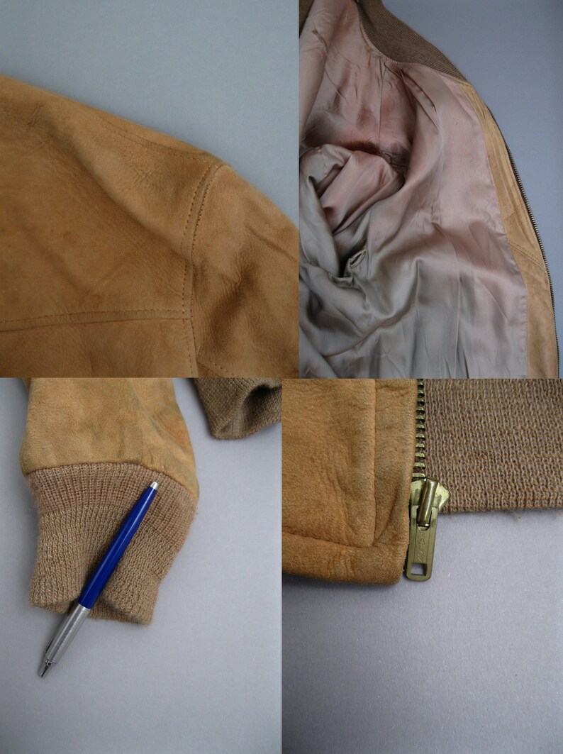 K&ouml;nnte beinhalten: Eine braune Wildlederbomberjacke mit Rei&szlig;verschluss und gerippten Strickb&uuml;ndchen und Kragen. Die Jacke hat ein braunes Satinfutter.
