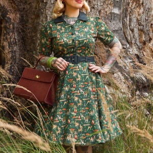 A model wearing a Dark Green Woodland Shirt Dress