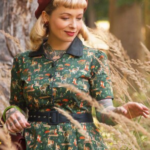 A model wearing a Dark Green Woodland Shirt Dress