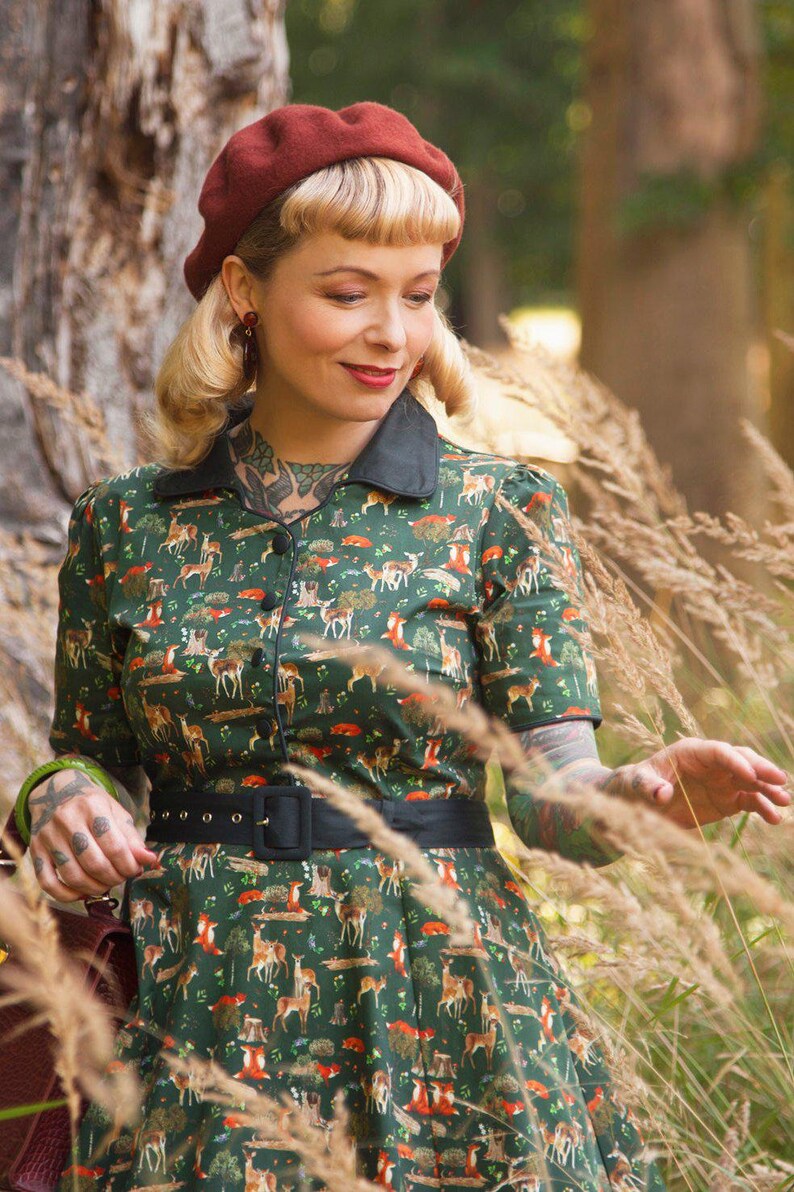 A model wearing a Dark Green Woodland Shirt Dress