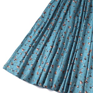Close up View of Duck Print Long Sleeved Swing Dress in Blue