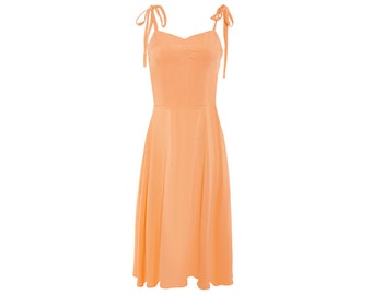 Lorraine Strapped dress with Sweetheart neckline in Light Orange