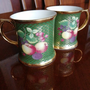 Beautiful pairs Vintage Bone China Tea/Coffee Mugs with fruits devotion, and gold lakeside