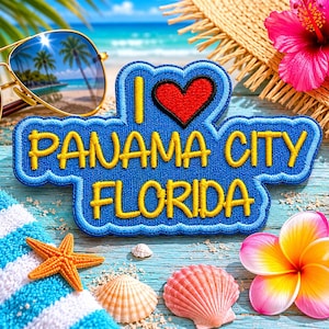 May include: A blue patch with yellow text that reads "I ❤️ PANAMA CITY FLORIDA" with a red heart. The image includes sunglasses, a starfish, seashells, and tropical flowers, evoking a beach vacation theme.
