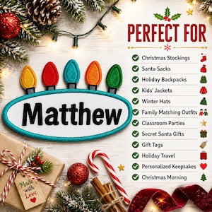 May include: An oval-shaped embroidered patch with a white center and teal border, featuring the name Matthew in black text. Five colorful light bulb-shaped icons in yellow, red, teal, orange, and green are attached to the top edge of the patch.