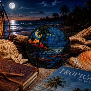 May include: A circular embroidered patch featuring a nighttime tropical beach scene with a full moon, palm trees, and ocean waves. The design uses shades of blue, orange, and black thread to depict a coastal landscape under a dark sky.